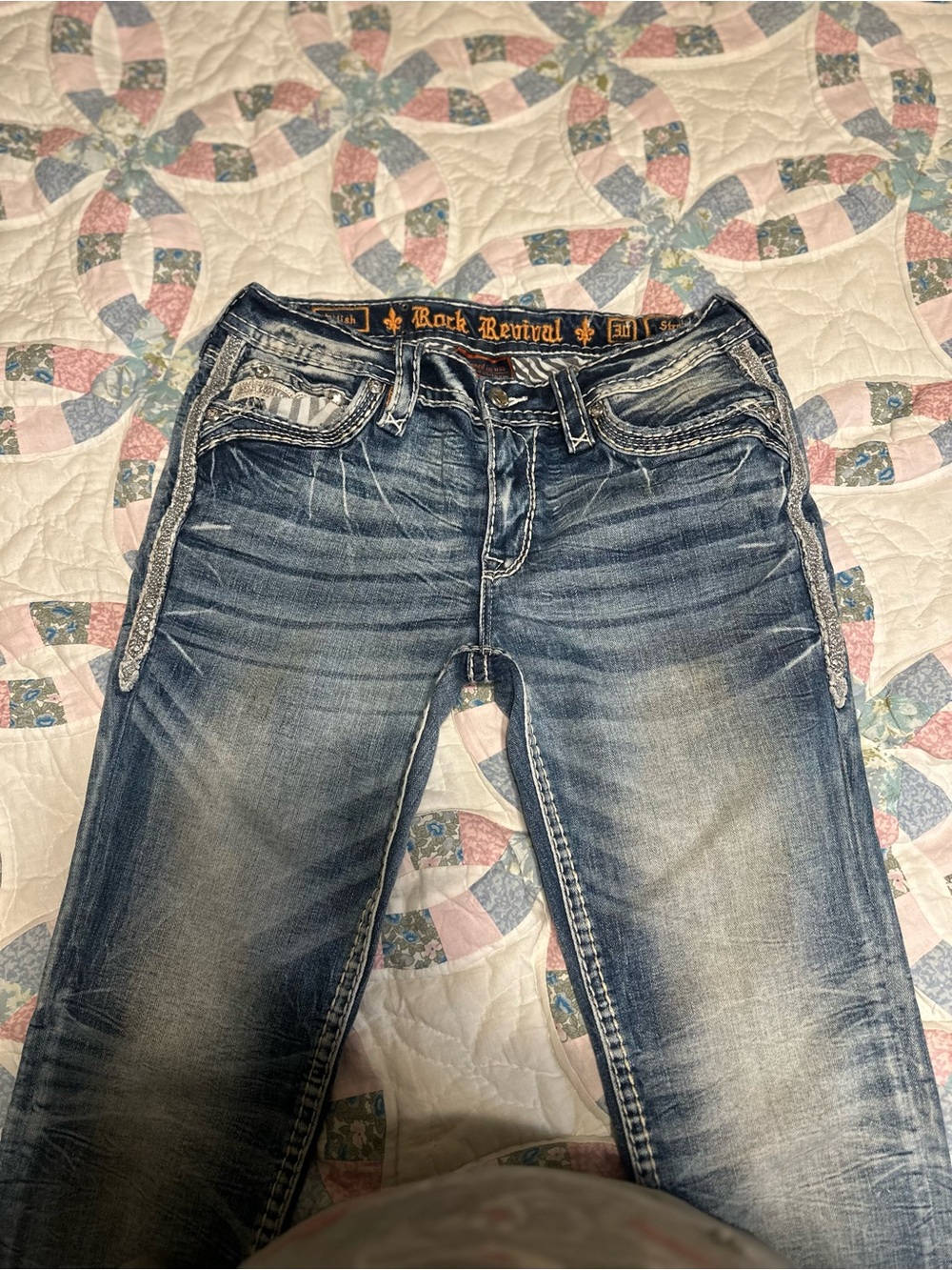 Rock Revival women’s Distressed Indigo Slim Straight Jeans